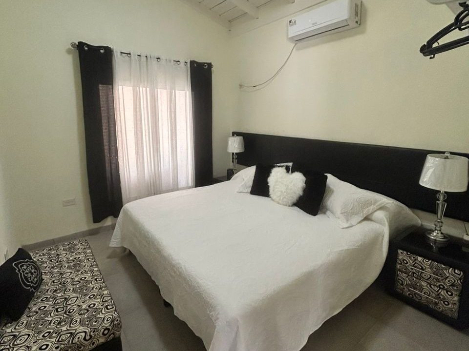 Habitación con cama queen